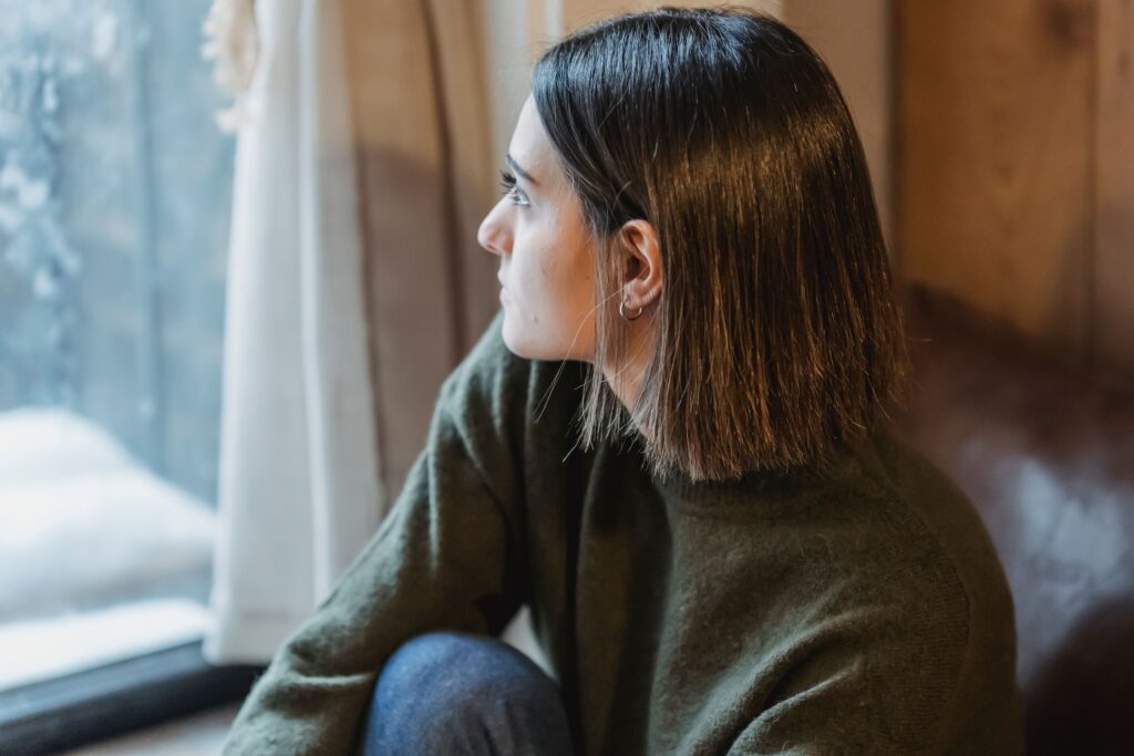Woman dealing with overthinking and anxiety before seeking counselling in London, Ontario